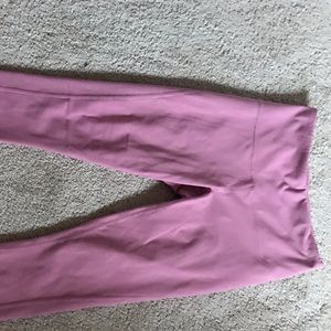 Pink leggings with back leg cutout detail
